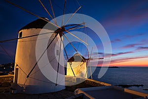 Traditional greek windmills on Mykonos island at sunrise, Cyclades, Greece