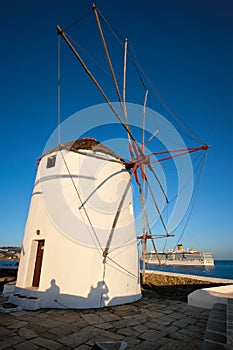 Traditional greek windmills on Mykonos island at sunrise, Cyclades, Greece
