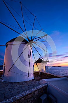 Traditional greek windmills on Mykonos island at sunrise, Cyclades, Greece