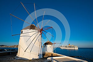 Traditional greek windmills on Mykonos island at sunrise, Cyclades, Greece