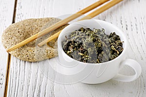 Traditional green Chinese tea. Tea on a white background. Tiguanin