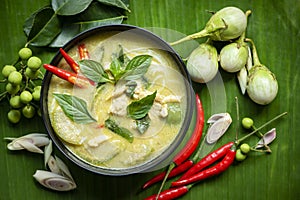Traditional green curry chicken cuisine asian food, Chicken green curry Thai food on soup bowl with ingredient vegetable herbs and