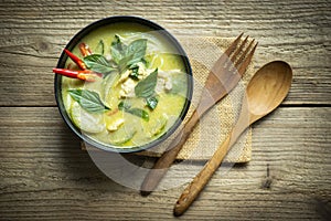 Traditional green curry chicken cuisine asian food, Chicken green curry Thai food on soup bowl with ingredient vegetable herbs and