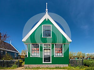 Traditional green Dutch historic house