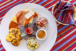 Traditional Guatemalan breakfast with tortillas photo