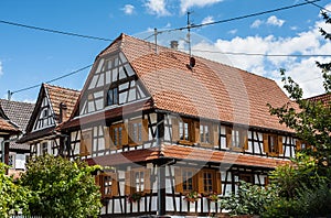 Traditional half-timbered houses in the streets of Hunspach in Alsace, France
