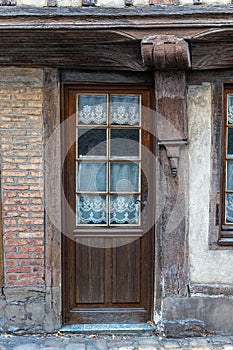 Traditional half-timbering house in historical part in France, Normandy Bernay