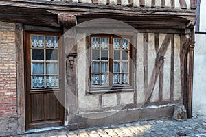 Traditional half-timbering house in historical part in France, Normandy Bernay