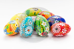 Traditional hand painted Easter eggs on white. Spring patterns