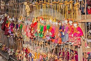 Traditional handicraft puppets are sold in a shop in Bagan, Myanmar
