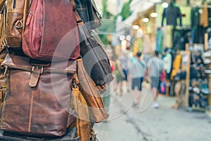 Traditional handmade leather bags and backpacks in the market of Chania. Island of Crete.