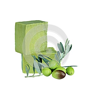 Traditional handmade organic green olive soap. Olive soap bars, green olives and olive branch with leaves isolated on white