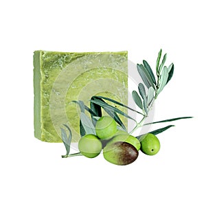 Traditional handmade organic olive soap. Olive soap bar, green olives and olive branch with leaves isolated on white background.
