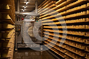 Modern cheese aging cave storage. Tete de moine, Switzerland photo