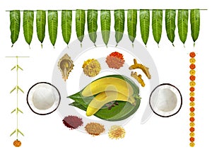 Traditional hindu pooja essential items, bannana, betel leaf, betel nuts, coconut, turmeric, kumkum, turmeric sticks, mari gold fl