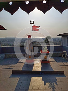 Traditional Hindu symbols at temple of Shiva at Chaul near Alibag