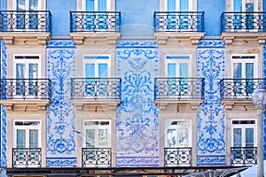 Traditional historic facade in Porto decorated with blue tiles, Portugal