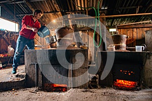 Traditional home made brandy distillery in country side of Romania, Horinca making in Maramures County