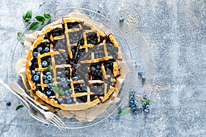 Traditional homemade american blueberry pie with lattice pastry