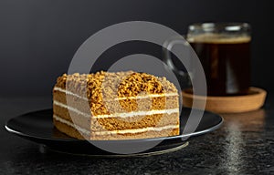 Traditional honey cake and black coffee