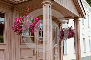 Traditional house with flowers in summer day