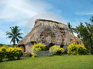 Traditional house of Navala village, Viti Levu, Fiji photo