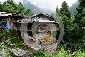Facade of the traditional house in Old Manali in India photo