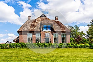 Traditional house with rustic thatched roof