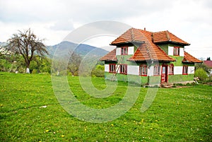 Traditional house on a spring hill