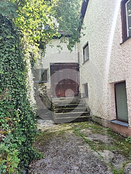 traditional houses at old town street with big wooden door