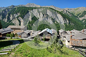 Traditional houses and roofs, with the church on the left, Saint Veran, Queyras Regional Natural Park photo