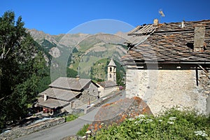 Traditional houses and roofs, with Reformee church, Saint Veran, Queyras Regional Natural Park