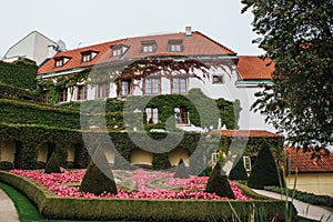 Traditional houses twined with plants near the Vrbov garden in Prague in the Czech Republic. Traditional Czech