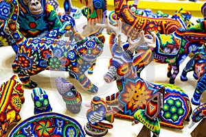 Traditional huichol bead ornament figures mexican culture