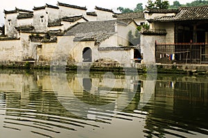 Traditional huizhou houses reflected on water