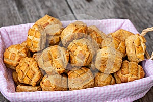 Traditional hungarian bakery pastry pogacsa in a basket
