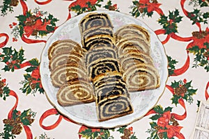 Traditional hungarian christmas sliced rolled cakes on table