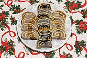 Traditional hungarian christmas sliced rolled cakes on table