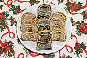 Traditional hungarian christmas sliced rolled cakes on table