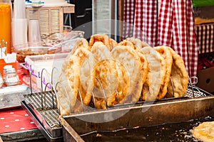 Traditional hungarian fried bread langos sold at a street vendor