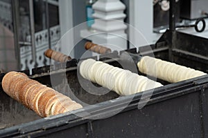 Traditional Hungarian street food. Homemade kurtosh kolac. Homemade trdelnik