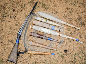 Traditional hunting pipes for luring deer in the mating season and an old gun