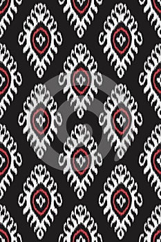 Traditional ikat pattern. eamless geometric pattern, based on ikkat fabric style.