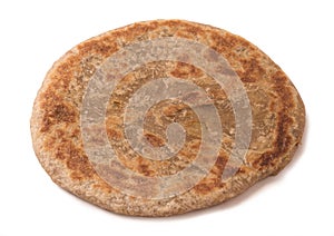 Traditional Indian Alu Paratha isolated on white background.