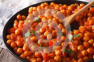 Traditional Indian cuisine: Chana masala macro. Horizontal