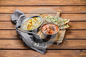Traditional indian cuisine naan curry masala biryani rice kitchen towel panir photo