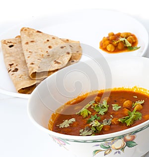 Traditional indian dal curry and chapatti