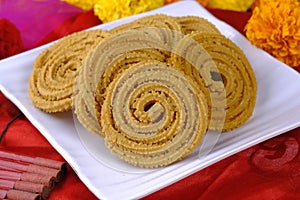 Traditional Indian Diwali snacks Chakali, murukku, Indian Traditional Tea Time Snack Chakli, Murukku, Muruku, Murkoo, Chakri,