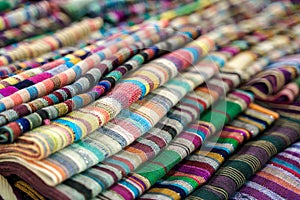 Traditional Indian fabric store. Colorful traditional indian hindi textile fabric wrap scarfs