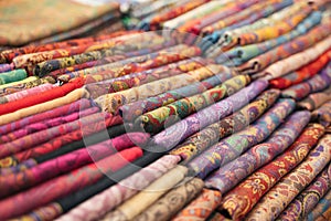 Traditional Indian fabric store. Colorful traditional indian textile fabric wrap scarfs